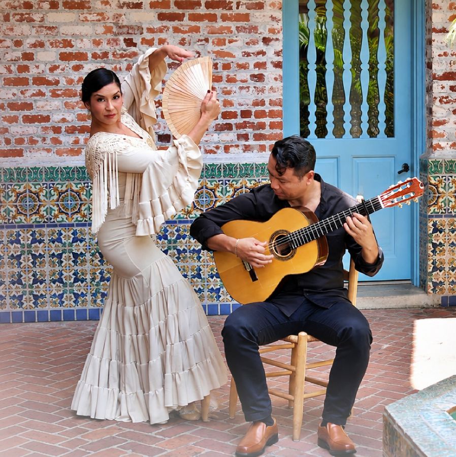 Flamenco Guitarist and Dancer Performing Together