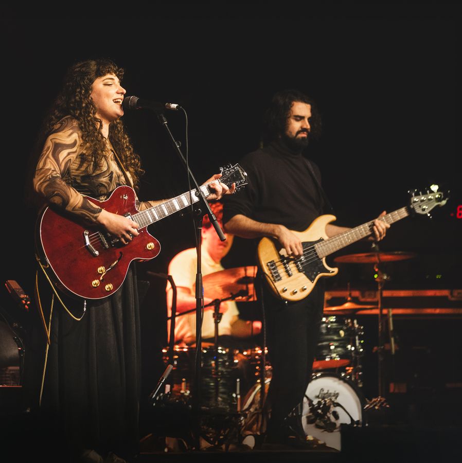 Singer-Songwriter Hannah Stokes Performing with Band