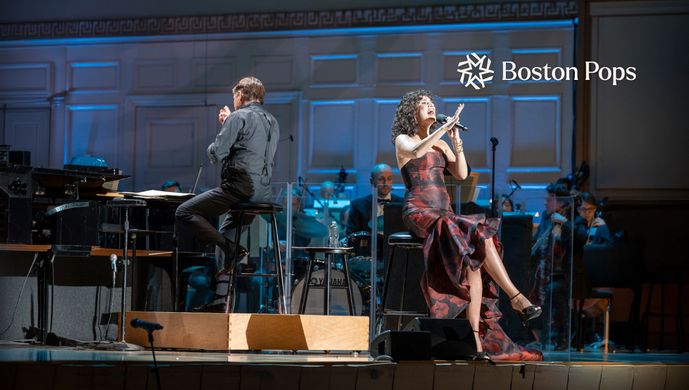 Boston Props Conductor Leading Orchestra with Vocalist on Stage