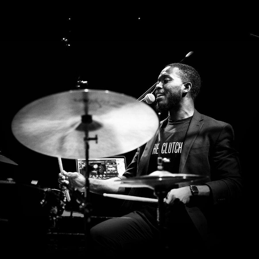 Jazz Drummer Leading a Live Band Performance