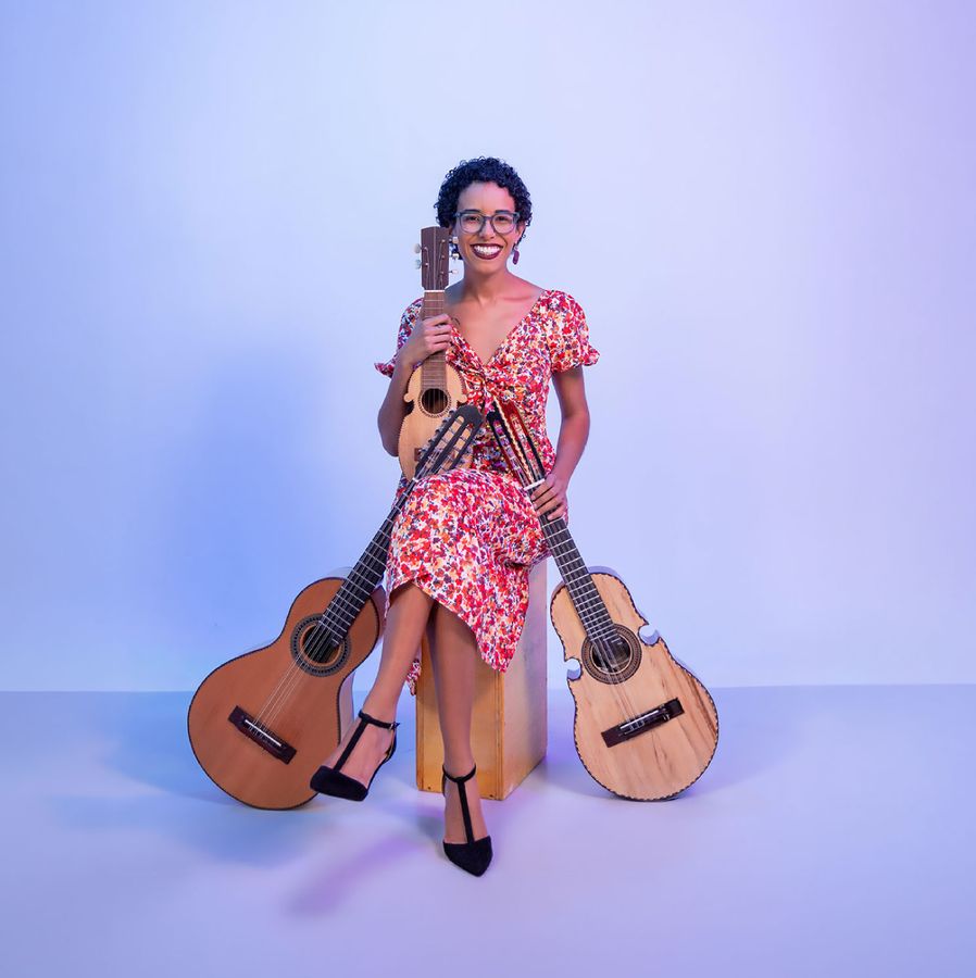 Musician Performing on a Traditional Puerto Rican Cuatro