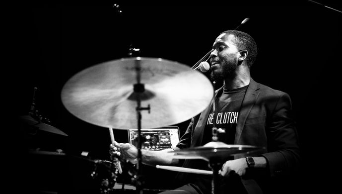 Jazz Drummer Leading a Live Band Performance