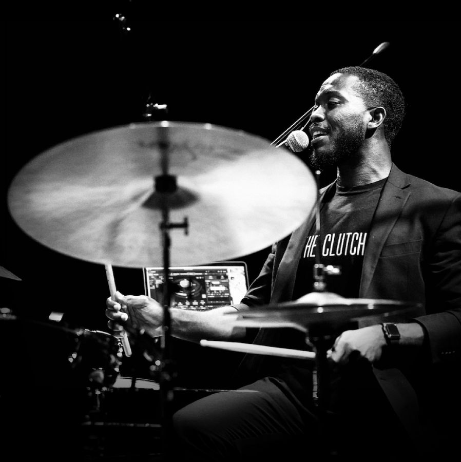 Jazz Drummer Leading a Live Band Performance