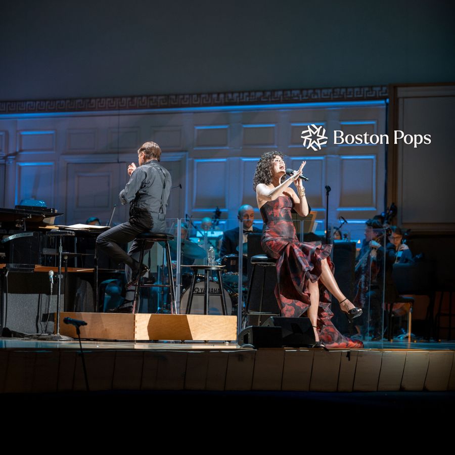 Boston Props Conductor Leading Orchestra with Vocalist on Stage